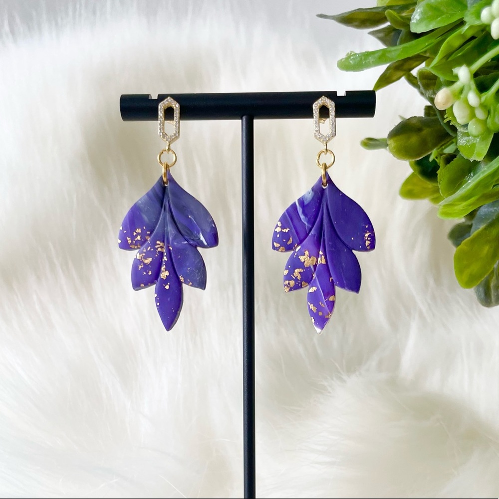 A handmade dangle made of polymerclay. It is extremely lightweight.